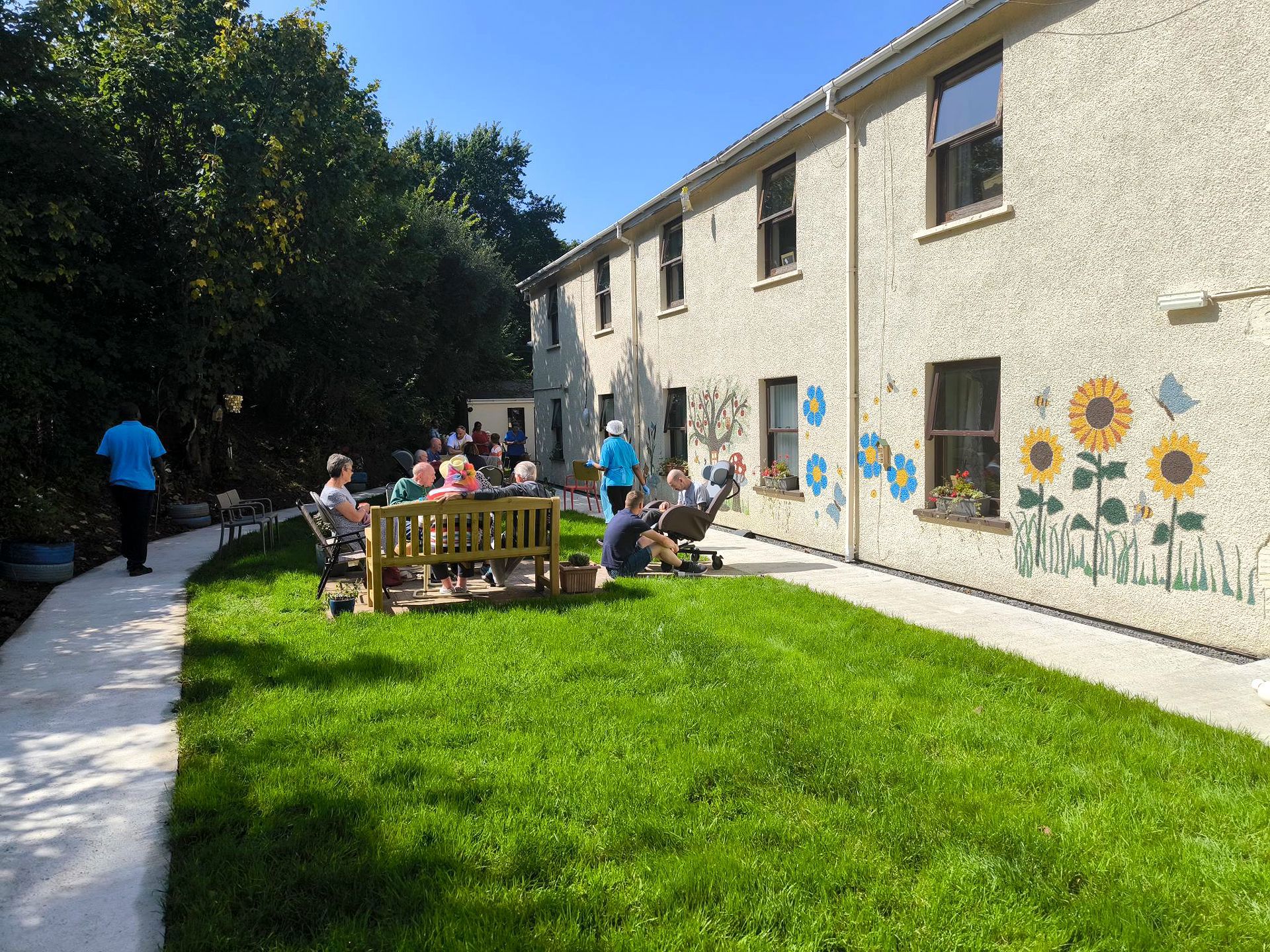 A resident gardening in the grounds at Rickeston Mill