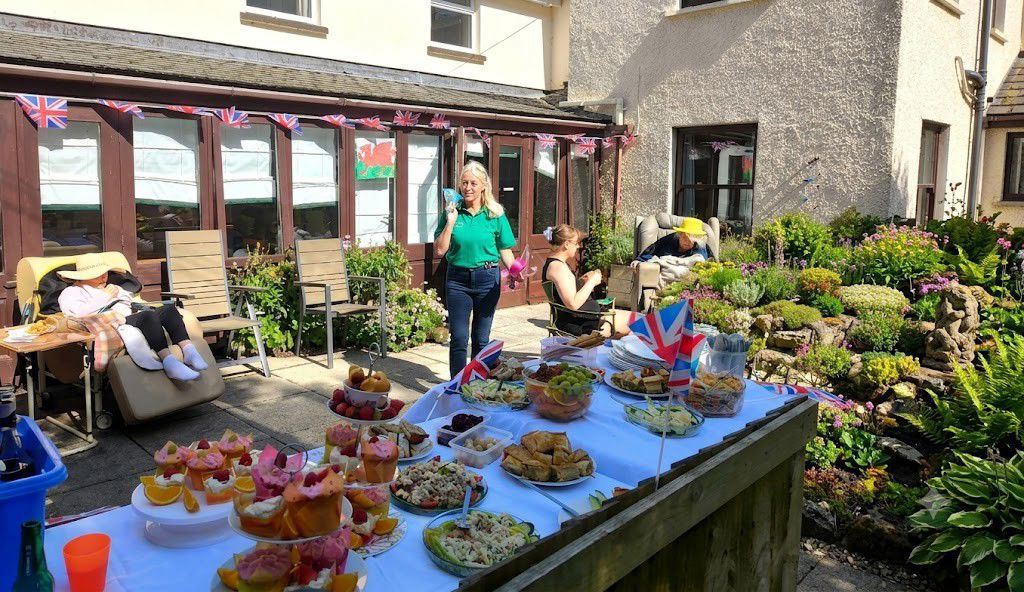 Residents enjoying a home-cooked meal together at Rickeston Mill