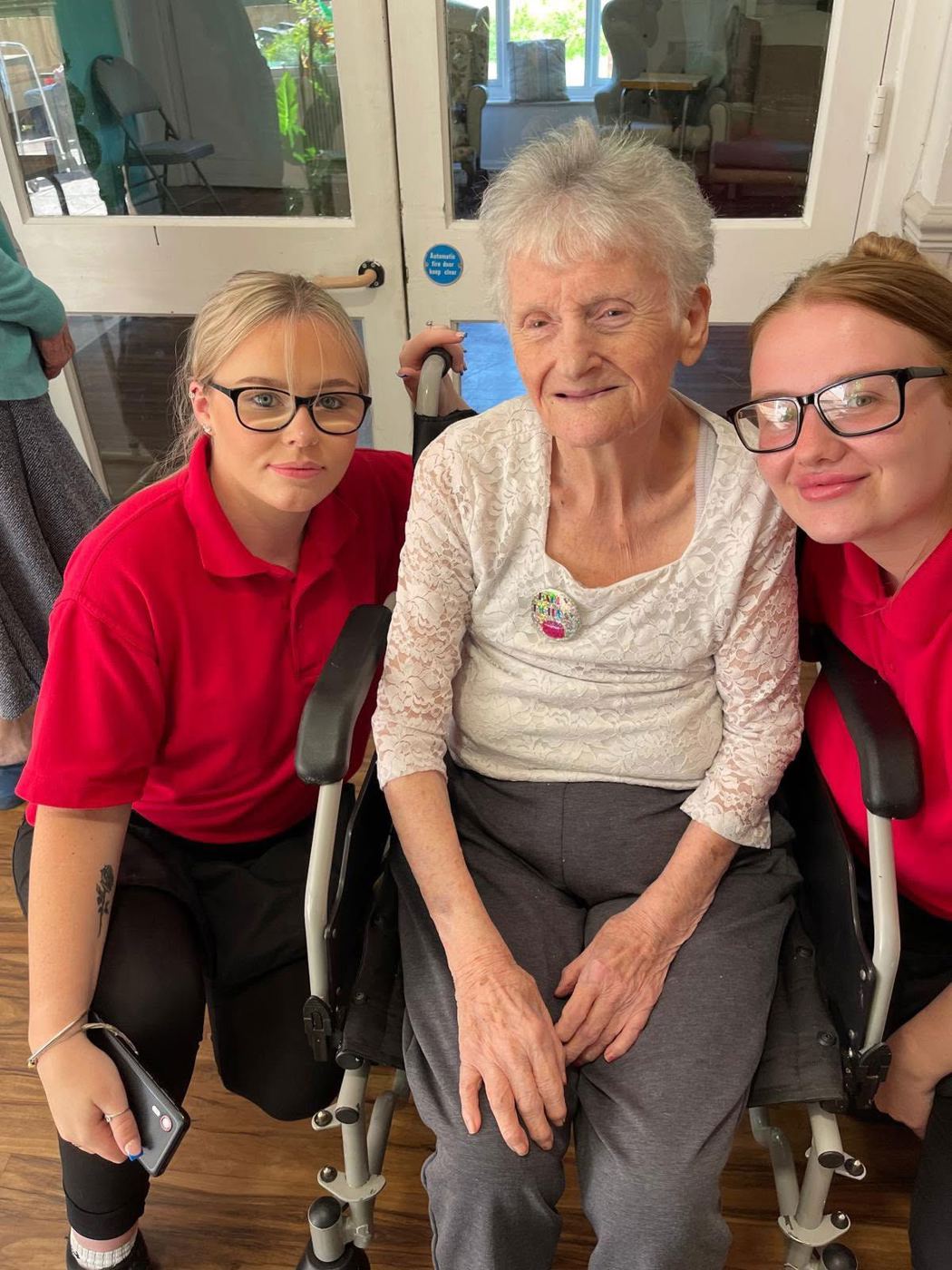 Two carers with a resident at Rickeston Mill